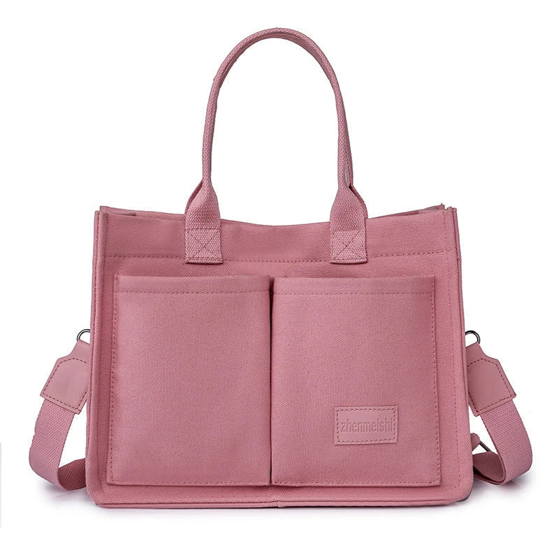 Stylish and durable canvas tote bag with multiple pockets for everyday use