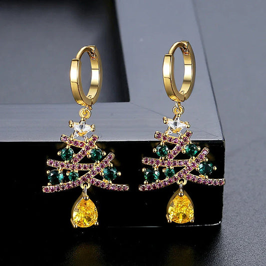 Pair of elegant Christmas tree earrings with a geometric design, sparkling rhinestones, and 18K gold electroplating