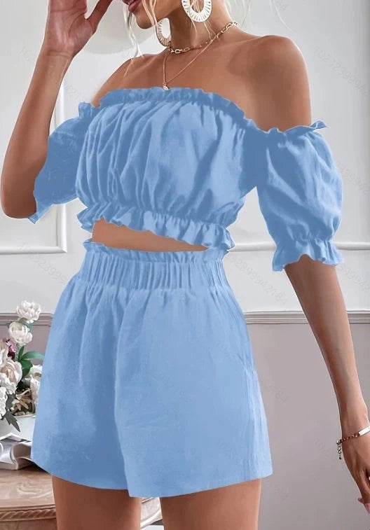 A stylish and comfortable ladies' shorts set with short sleeves, available in yellow and blue colors and a range of sizes.