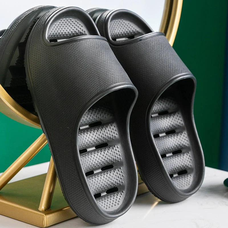 Thick-soled EVA slippers in various colours with non-slip sole and water leakage design