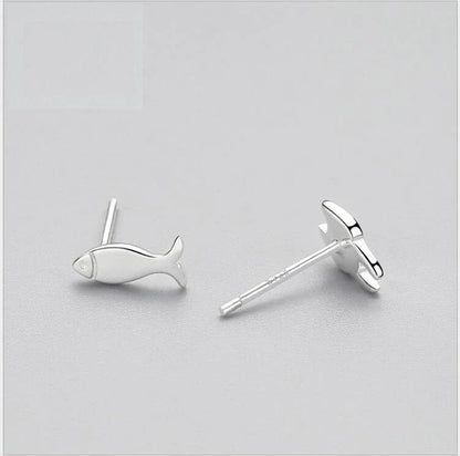 Elegant asymmetric 925 sterling silver stud earrings with cat and fish motifs, a modern and sophisticated accessory