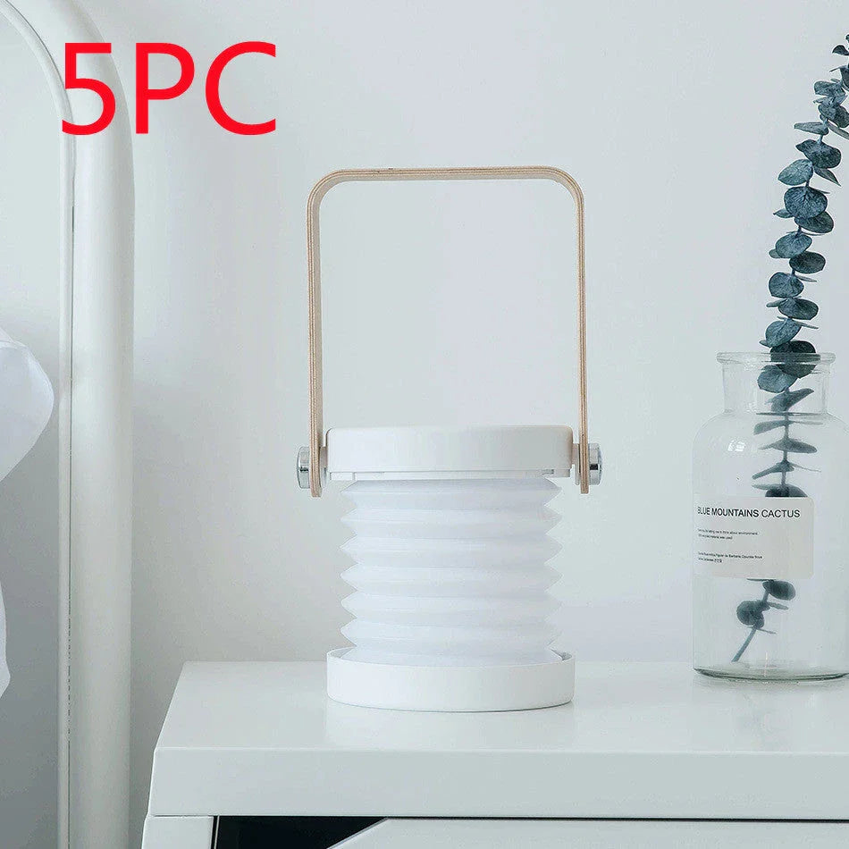 Elegant foldable LED lamp with touch-controlled dimming, rechargeable battery, and modern design for home decor