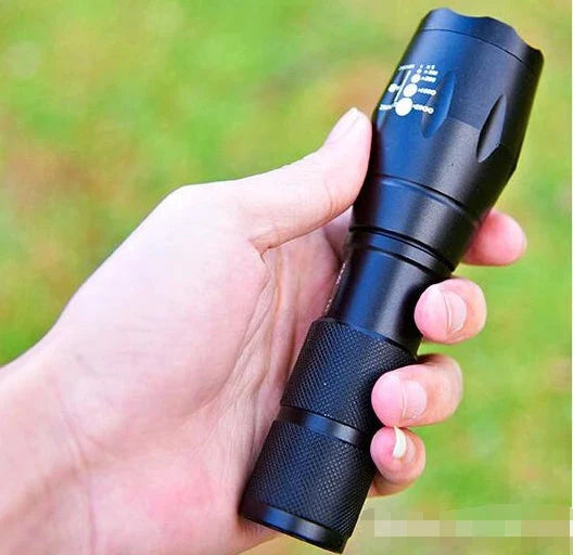 High-powered outdoor LED flashlight with adjustable beam and durable aluminum alloy construction