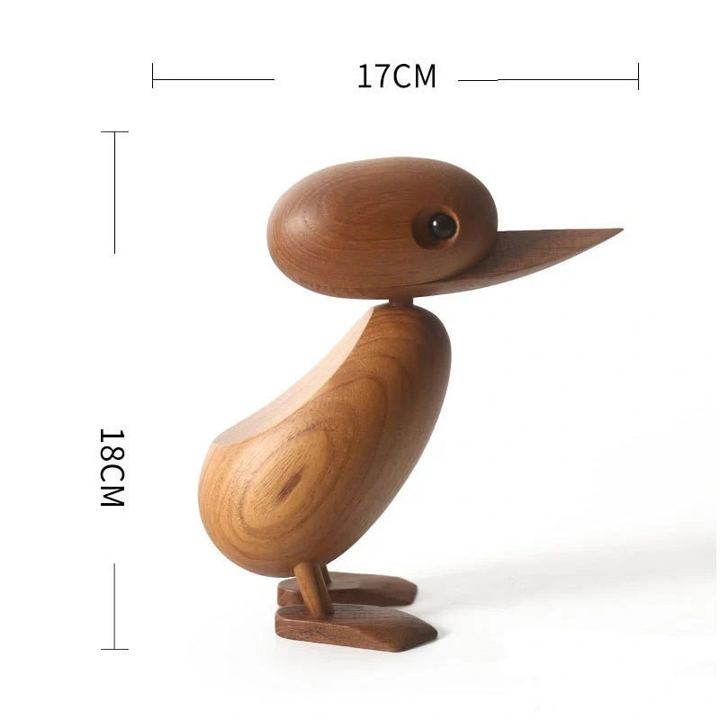 Handcrafted teak wood duck toy in duck yellow, available in large and small sizes