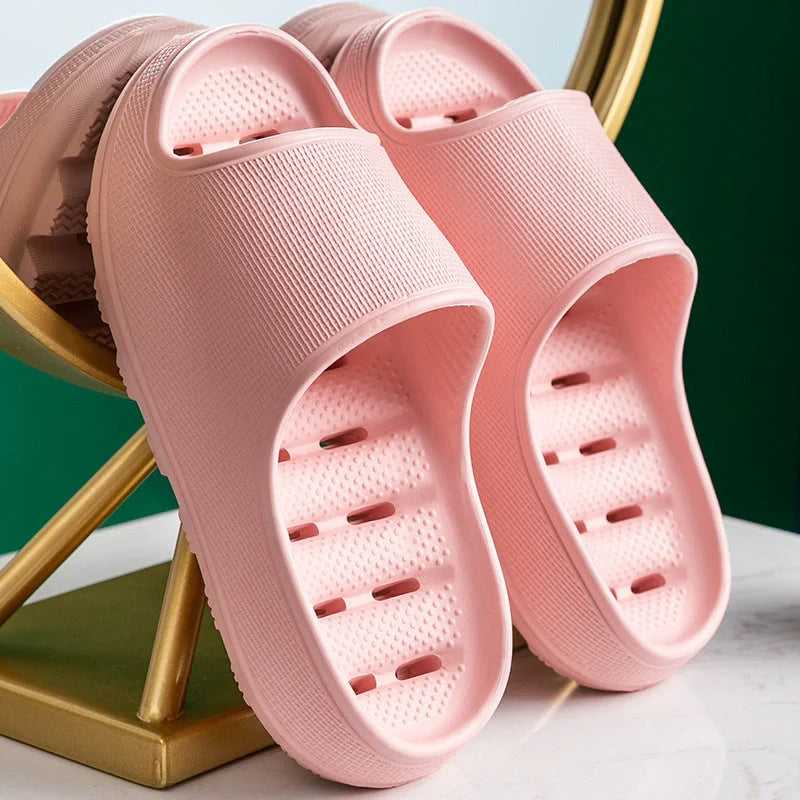 Thick-soled EVA slippers in various colours with non-slip sole and water leakage design