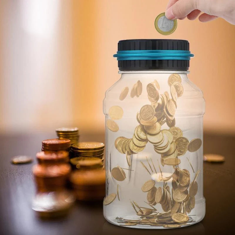 Transparent digital money box with LCD coin counter, designed for effortless coin saving and tracking in the UK