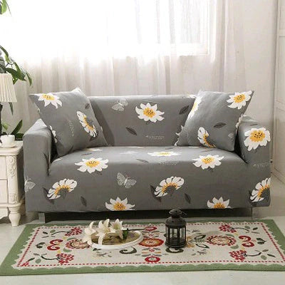 Stretchable geometric print sofa cover on a three-seater sofa
