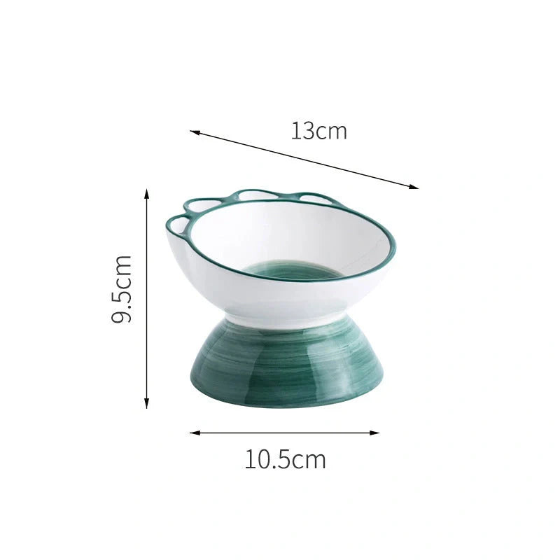 Ceramic pet bowl with 15-degree incline design in pink, green, and blue