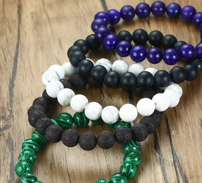 Natural Black Lava Rock and White Stone Stretch Bracelet showcasing unique natural stone beads