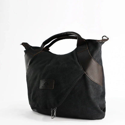 Stylish and versatile canvas shoulder bag with premium brass hardware and thoughtful interior organisation