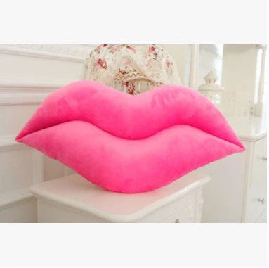 Adorable lip-shaped plush pillow for children in pink and red, perfect for cuddles and decor