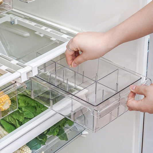 Transparent rectangular storage box with modular grid system for organised storage in kitchen or office