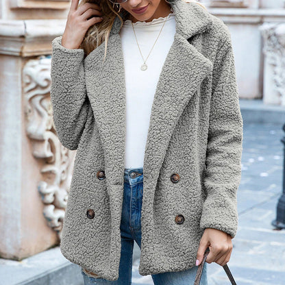 Cozy and stylish winter jacket for women, featuring a fluffy design, button closure, and a range of color options