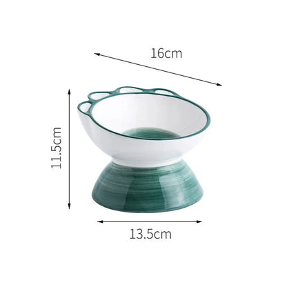 Ceramic pet bowl with 15-degree incline design in pink, green, and blue