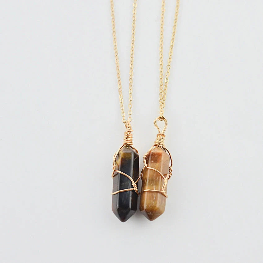 Elegant hexagonal quartz crystal necklace pendant on gold chain