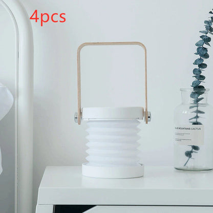 Elegant foldable LED lamp with touch-controlled dimming, rechargeable battery, and modern design for home decor