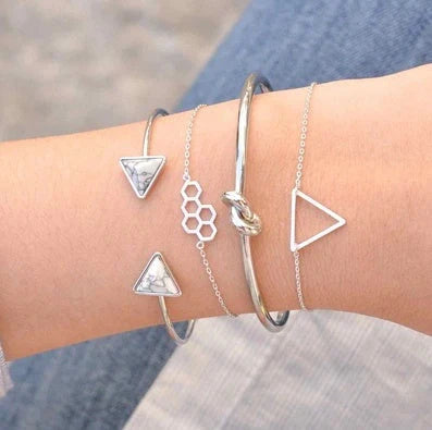 Adjustable geometric bracelet set with crystal and leaf motifs