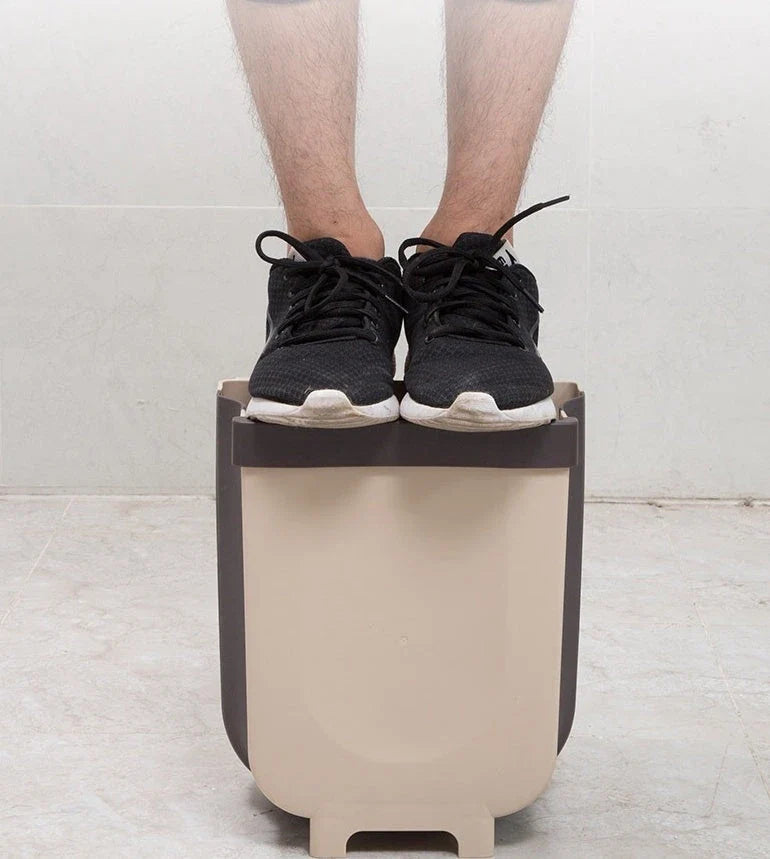 Foldable wall-mounted bin in brown and white colours, with a spacious 9-litre capacity and a sleek, space-saving design