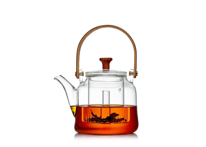 Elegant Japanese-style glass teapot with bamboo handle, perfect for brewing loose-leaf teas
