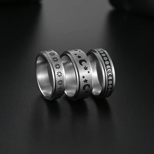 Titanium steel rings with captivating celestial designs including stars, moons, and floral motifs