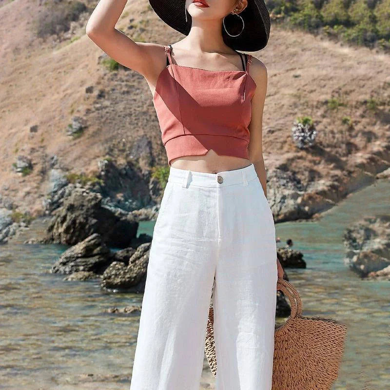 Stylish and comfortable cotton and linen trousers for British women, featuring a high-waist, straight-leg design in a range of classic colours.