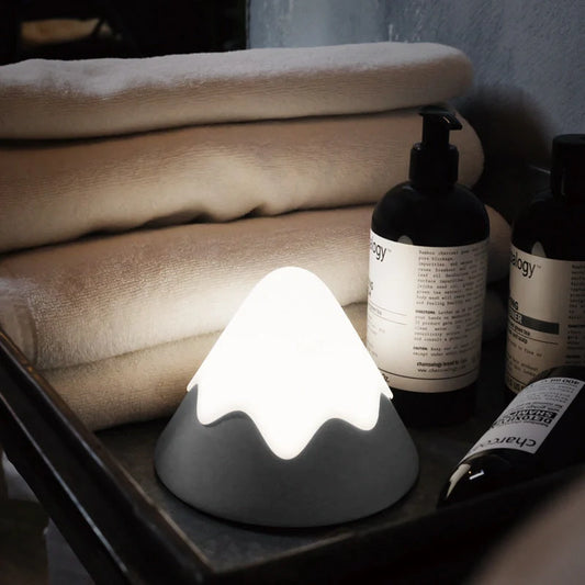 Snow Mountain Induction Night Light with warm white LEDs and compact design