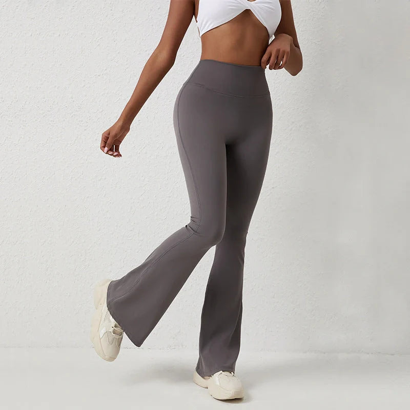 Premium high-rise slimming trousers with wide leg, crafted from Naked Sensation fabric for superior comfort and a flattering fit