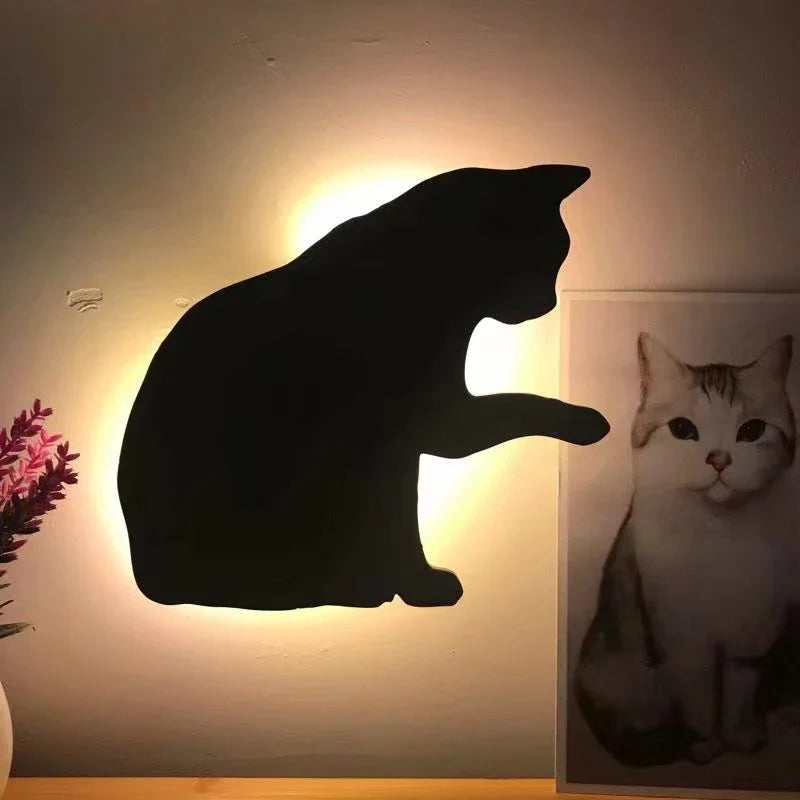 A stylish cat-shaped smart sensor night light that automatically illuminates a room when motion is detected, creating a warm and cozy atmosphere.