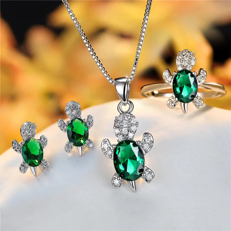 Stylish turtle pendant necklace with vibrant rainbow stones, perfect for women and children.