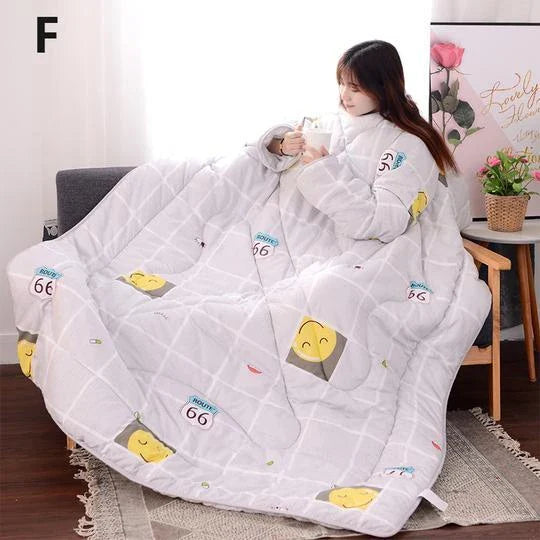 Cozy quilted lounger with sleeves in various colors and sizes, perfect for year-round indoor comfort and relaxation.