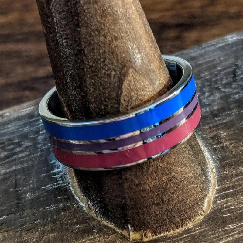 Stylish bisexual pride stainless steel ring with a bold, geometric design in vibrant colours