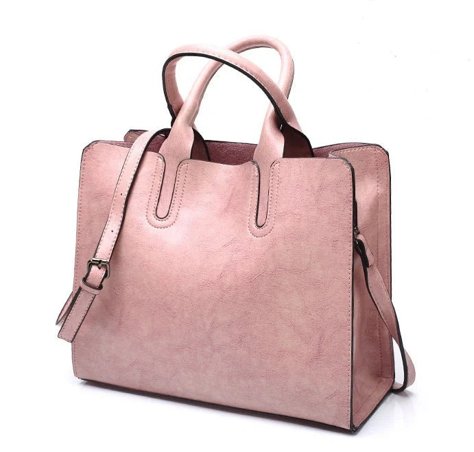 Sofia Spanish Trunk Tote in various colours with multiple compartments and zipper opening