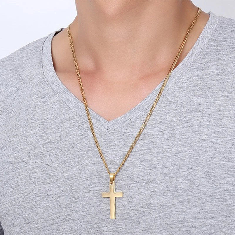 Stainless steel cross pendant necklace in black, silver, and gold colours, showcasing a classic and elegant design