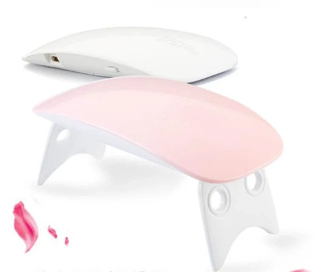 Compact and portable USB-powered nail light therapy machine with adjustable angle and LED light for at-home nail care