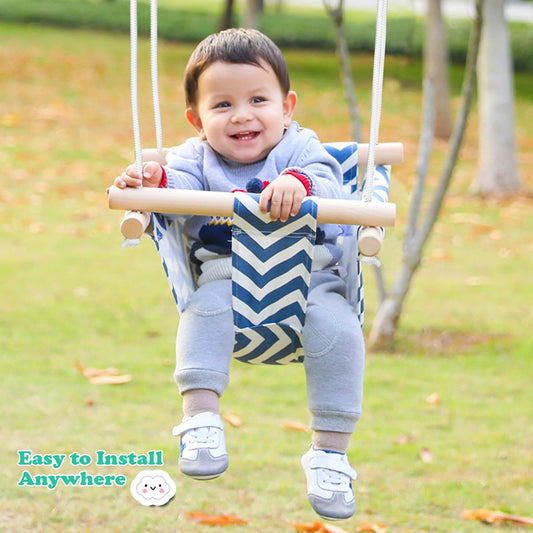 Infant hanging chair with blue and white canvas seat and adjustable rope