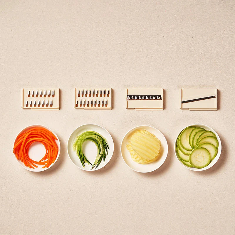 Versatile vegetable chopper with various blades, basket, and cleaning brush - efficient tool for slicing, dicing, shredding, and more