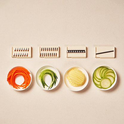 Versatile vegetable chopper with various blades, basket, and cleaning brush - efficient tool for slicing, dicing, shredding, and more