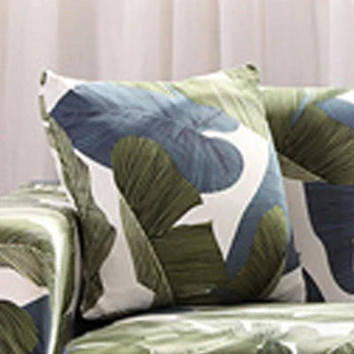 Stretchable geometric print sofa cover on a three-seater sofa