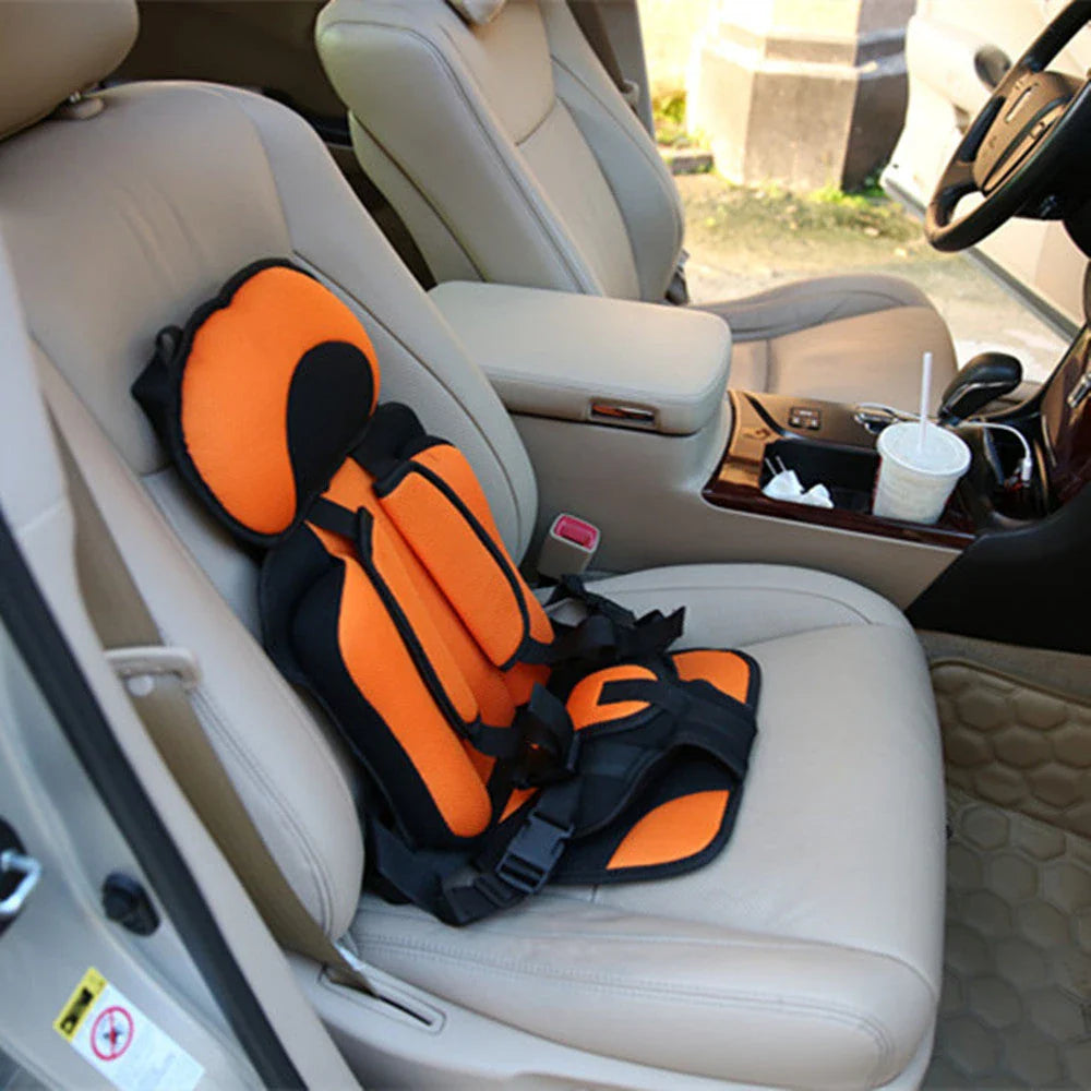 Deluxe Convertible Car Seat with adjustable recline, five-point harness, and removable, machine-washable cover