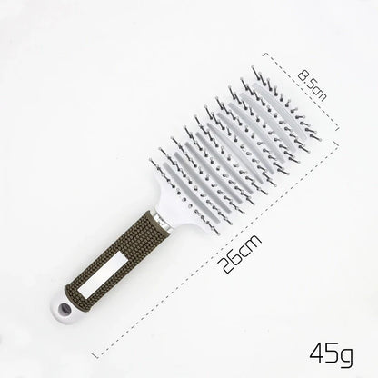 A premium hair brush with a sleek design, featuring soft bristles and a rounded massage function for healthy, detangled hair