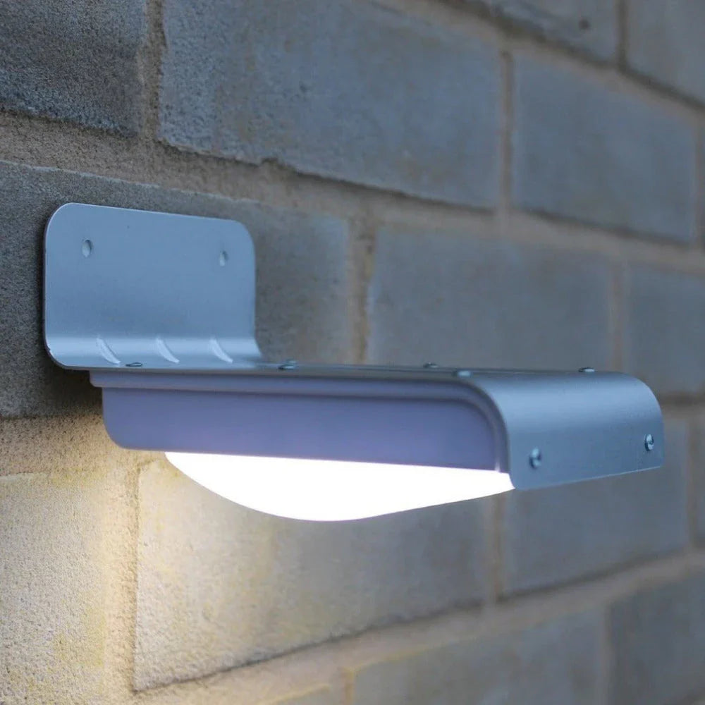 Solar-powered motion-activated outdoor light with bright LED illumination, weatherproof design, and automatic sensor activation