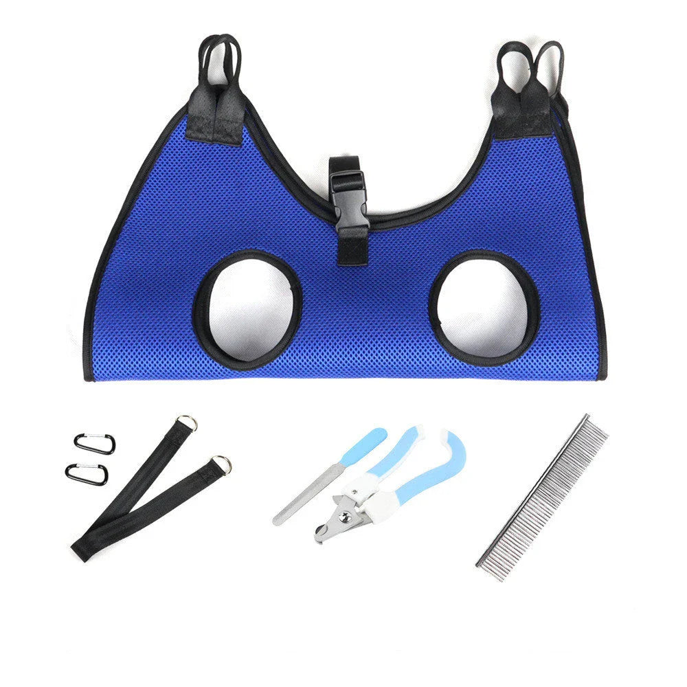 Adjustable pet grooming hammock with straps, buckles, comb, and nail clipper for convenient nail trimming and bathing of cats and dogs