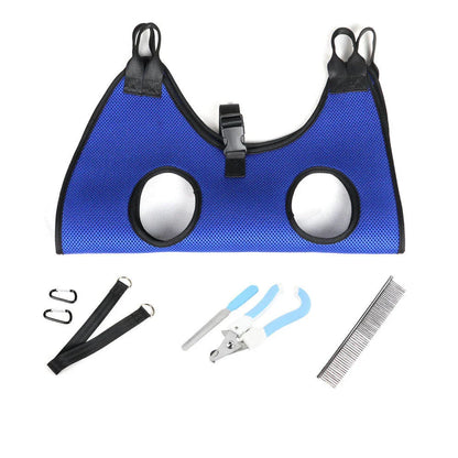 Adjustable pet grooming hammock with straps, buckles, comb, and nail clipper for convenient nail trimming and bathing of cats and dogs