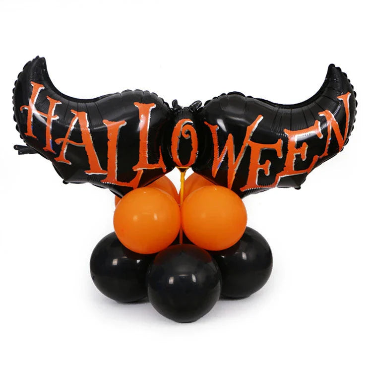 Spooky Halloween balloon decorations featuring pumpkins and bats in various styles