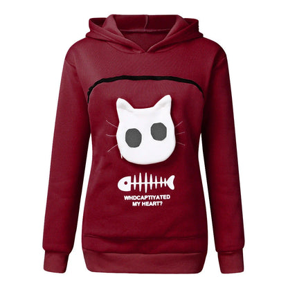 A stylish hooded jumper with a unique cat-themed pocket design, made from premium cotton fabric.