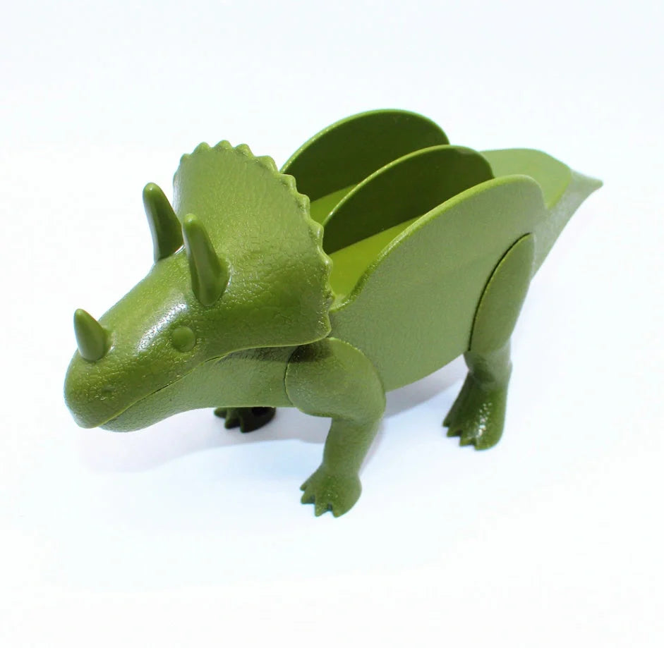 Dinosaur-shaped plastic taco holder in green, pink, or army green