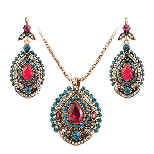 Elegant bohemian-style jewellery set featuring necklaces, earrings, and rings in a variety of colours and sizes