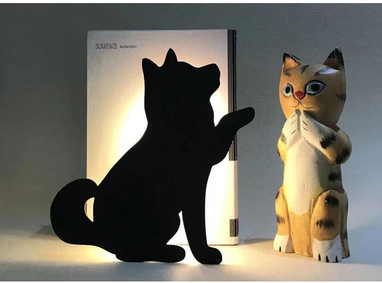 A stylish cat-shaped smart sensor night light that automatically illuminates a room when motion is detected, creating a warm and cozy atmosphere.