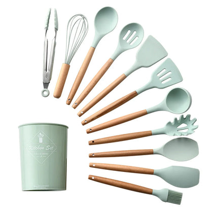 Silicone kitchenware set with wooden handles in various colors and styles, perfect for cooking, baking, and serving