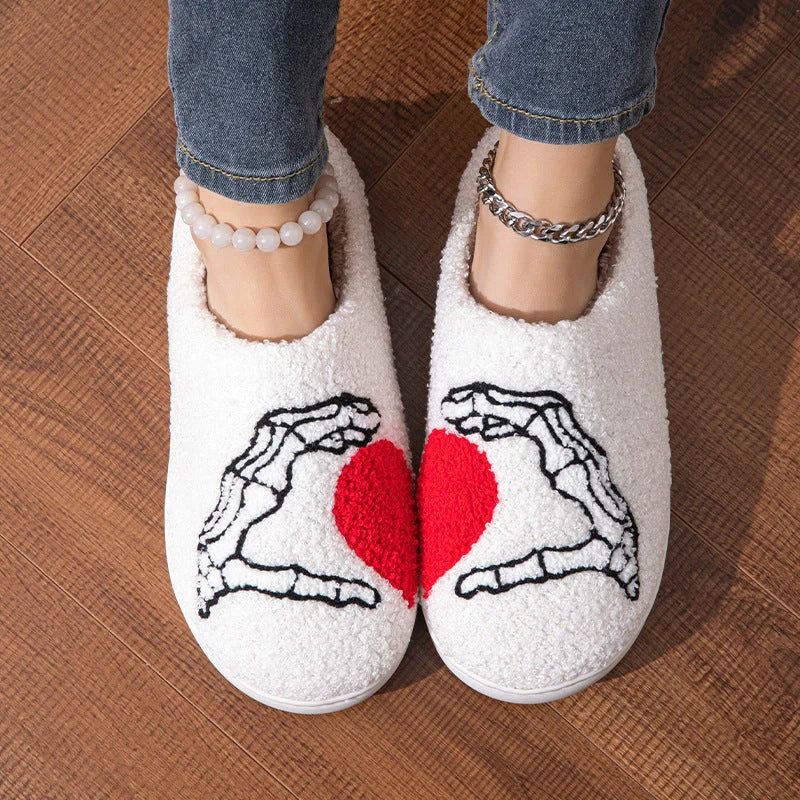 Halloween Skull Hand Slippers in black and white with non-slip soles